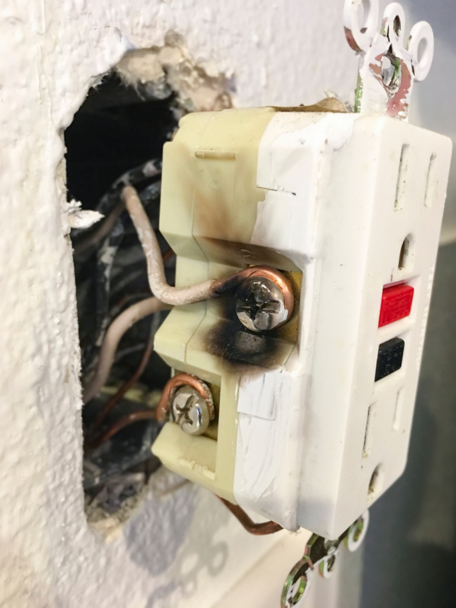 scorched GFCI outlet that constantly trips