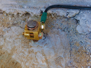 Electrical grounding rod outside Miami, FL home