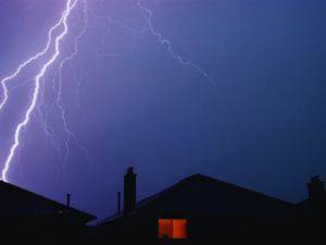 Lightning bolt above homes
